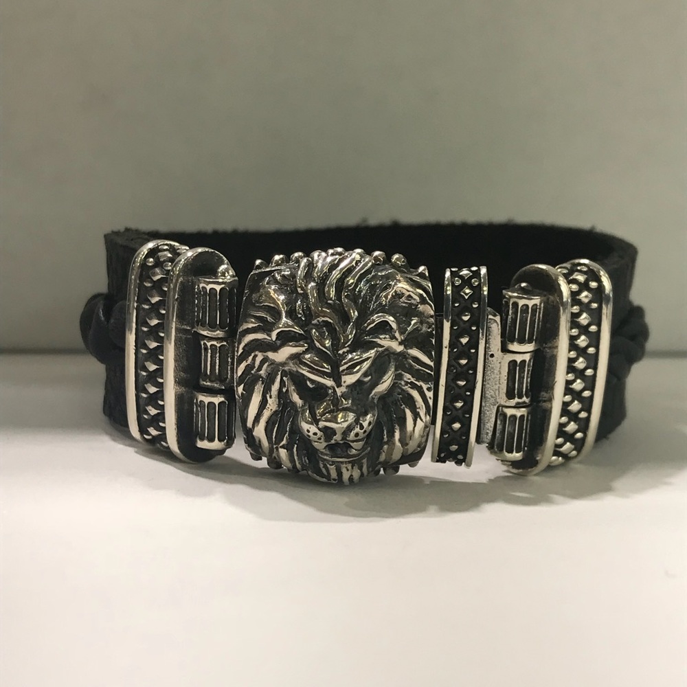 sterling silver lion face bracelet with  leather
